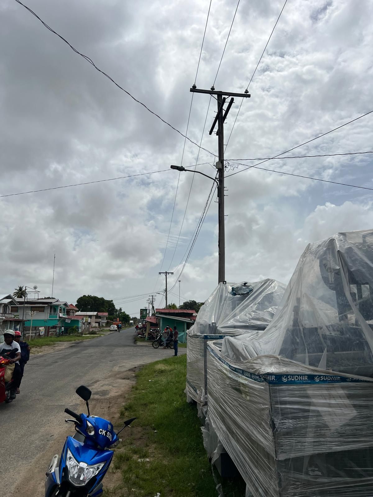 Finished power pole and lines on a street